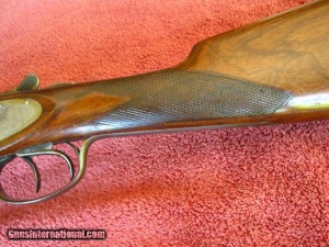 20 gauge L.C. Smith Field Featherweight. 28" bbls, straight-grip stock