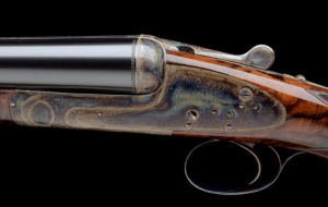 HARTMANN & WEISS: AN EXCEPTIONAL 12-BORE GULLERT-ENGRAVED BOSS-TYPE SINGLE-TRIGGER ROUNDED BAR SELF-OPENING SIDELOCK EJECTOR, serial no. 2403