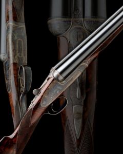 HARTMANN & WEISS: AN EXCEPTIONAL 12-BORE GULLERT-ENGRAVED BOSS-TYPE SINGLE-TRIGGER ROUNDED BAR SELF-OPENING SIDELOCK EJECTOR, serial no. 2403