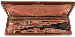 (A) TRULY SUPERB QUALITY, BEAUTIFULLY RELIEF GOLD INLAID AND ENGRAVED PERCUSSION SHOTGUN BY KOEZ